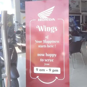 honda vehicle showroom indoor board with service timing and customer welcome message