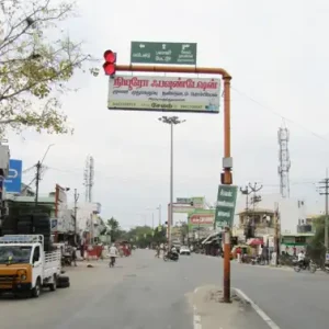 Neuro Foundation Signal Board on Busy Erode Street with Traffic