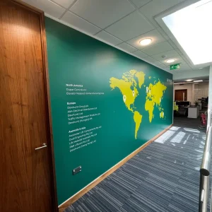 Corporate-Signage-Dewhurst-Group-Wall-Vinyl-scaled-1.webp