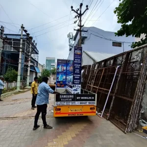 Samsung Road Show Vehicle with Banner Displaying Promotional Offers