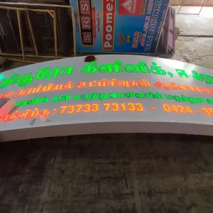 Neon signboard for [Business Name] with contact details and services