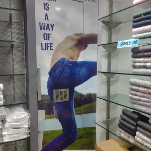 Volume Zero Denim Branding on Ready-Made Indoor Display Board – Clothing Store Visual Merchandising
