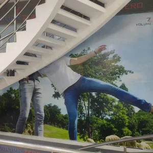ready made indoor board with denim fashion advertisement under staircase