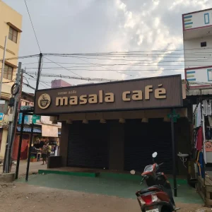 Masala Café illuminated name board with modern design